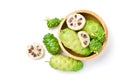Top view of Noni or Morinda Citrifolia fruits in wooden bowl