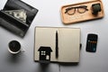 Notebook, house model, calculator and wallet on white background.