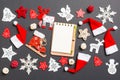 Top view of notebook. New Year decorations on black background. Merry Christmas concept Royalty Free Stock Photo