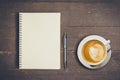 Top view notebook and pen with coffee cup on wood table, Vintage Royalty Free Stock Photo