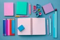 Top view of notebooks, pens, color pencils, marker and watercolor School stationery Royalty Free Stock Photo