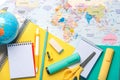 Top view of notebooks,school supplies and earth globe. Back to school concept Royalty Free Stock Photo