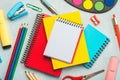 Top view of notebooks,school supplies and spiral notepad with space for text. Back to school concept Royalty Free Stock Photo