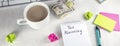 Top view of notepad with words TAX planning, stickers, cup of coffee and money on table. financial planning to save money for Royalty Free Stock Photo