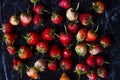 Top of view Numerous bright red strawberries are stacked