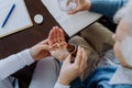 Top view of nurse giving medicine to senior woman at her home. Royalty Free Stock Photo