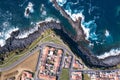 Top view of the ocean surf on the reefs coast of San Miguel island, Azores