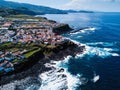 Top view of the ocean surf on the reefs coast of San Miguel island, Azores.