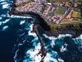 Top view of the ocean surf on the reefs coast San Miguel island - Azores.