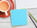 Top view office desk with blue and yellow sticky note Royalty Free Stock Photo