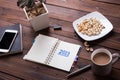 Top view office desk mockup: laptop, notebook, smartphone. New year 2017 resolution Royalty Free Stock Photo