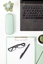 Top view of office desk. Table with laptop and office supplies. Flat lay home office workspace, remote work, distant learning, Royalty Free Stock Photo