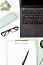 Top view of office desk. Table with laptop and office supplies. Flat lay home office workspace, remote work, distant learning, Royalty Free Stock Photo