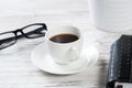 Top view office desk with white cup of coffee Royalty Free Stock Photo