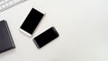 Top view office table desk. Workspace with smarth phone and keyboard on white background Royalty Free Stock Photo