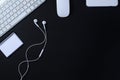 Top view of office work space, black desk table with keyboard, mouse, notebook and external hard drive. With a copy space, flat Royalty Free Stock Photo