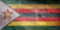 Top view of official retro flag Zimbabwe with grunge texture. travel and patriot concept. no flagpole. Plane design, layout. Flag