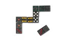 Top view old black color dominoes with colorful dot pieces on white floor background.