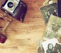 Top view of old camera, antique photographs. Royalty Free Stock Photo