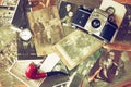 Top view of old camera, antique photographs and old pocket clock. Royalty Free Stock Photo