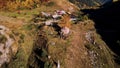 Top view of old houses in mountain valley in autumn. Footage. Beautiful landscape with old small village in mountain Royalty Free Stock Photo