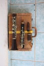 Top View An old instrument, an old and broken wooden carinet, no longer usable in a wooden case. Royalty Free Stock Photo