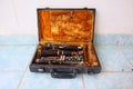 Top View An old instrument, an old and broken wooden carinet, no longer usable in a wooden case. Royalty Free Stock Photo