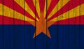 Top view of Old Painted Flag of Arizona state, USA on Dark Wooden Fence, wall.US patriot and travel concept. no flagpole. Flag Royalty Free Stock Photo