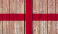 Top view of Old Painted Flag of England on Dark Wooden Fence, wall. patriot and travel concept. no flagpole. Flag background. Royalty Free Stock Photo
