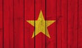 Top view of Old Painted Flag of Vietnam on Dark Wooden Fence, wall. patriot and travel concept. no flagpole. Flag background.