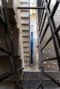 Top view of an old rectangular spiral staircase in an old building Royalty Free Stock Photo