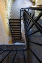 Top view of an old rectangular spiral staircase in an old building Royalty Free Stock Photo