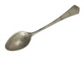 Top view of old silver beautiful tea spoon isolated on white background Royalty Free Stock Photo