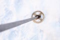Top view of the old ski pole in snowy field Royalty Free Stock Photo
