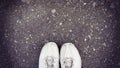 Top view of old sneaker on street with copy space, vintage style Royalty Free Stock Photo