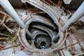 Top view of old vintage decorated spiral staircase in abandoned mansion Royalty Free Stock Photo