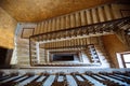 Top view of old vintage decorated staircase in abandoned mansion Royalty Free Stock Photo