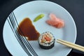 Top view of one Makizushi sushi fresh maki roll served on a plat