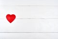 Top view of one red paper heart on white wooden background, copy space for text. Greeting card mockup for Saint Valentines Day, Royalty Free Stock Photo