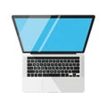 Top view of open laptop computer with bright blue screen display and keyboard Royalty Free Stock Photo