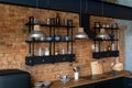 Top view on open space industrial loft kitchen with vintage decor and black cabinets