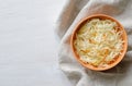 Top view of bowl of sauerkraut with cabbage on towel Royalty Free Stock Photo