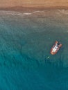 Top view of an orange rescue boat moored near the beach at Vatera, Lesvos, Greece Royalty Free Stock Photo