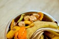 Top view of organic composting with leftover from kitchen