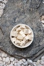 Top view organic Raw Soy tofu cheese close-up on stone background Royalty Free Stock Photo