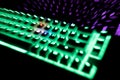 Top view out of focus image of illuminated RGB keyboard in the dark Royalty Free Stock Photo