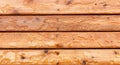 Top view of outdoor wooden stain deck boards with natural rain water on top of them Royalty Free Stock Photo