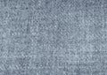 Top view over soft woolen grey textil texture scarf.