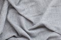 Top view over soft woolen grey textil texture