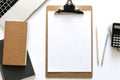 Top view over the working desk with notebook, pencil, paper, laptop and calculator. Copy space for text. Flat lay of a workplace o Royalty Free Stock Photo